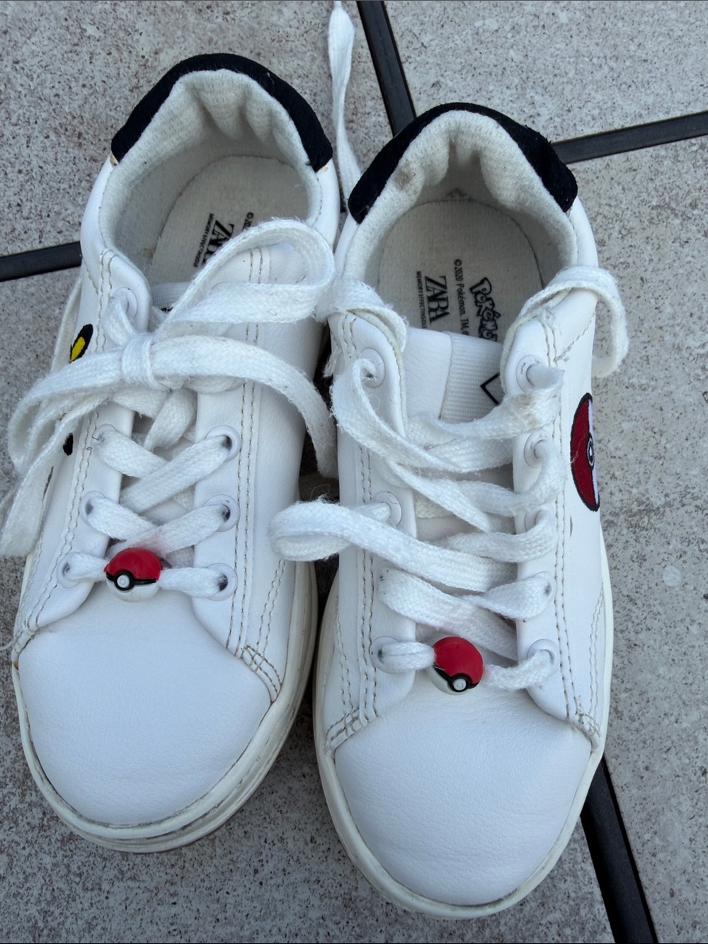 Zara White Kids Sneakers with Red Poké Ball Accent